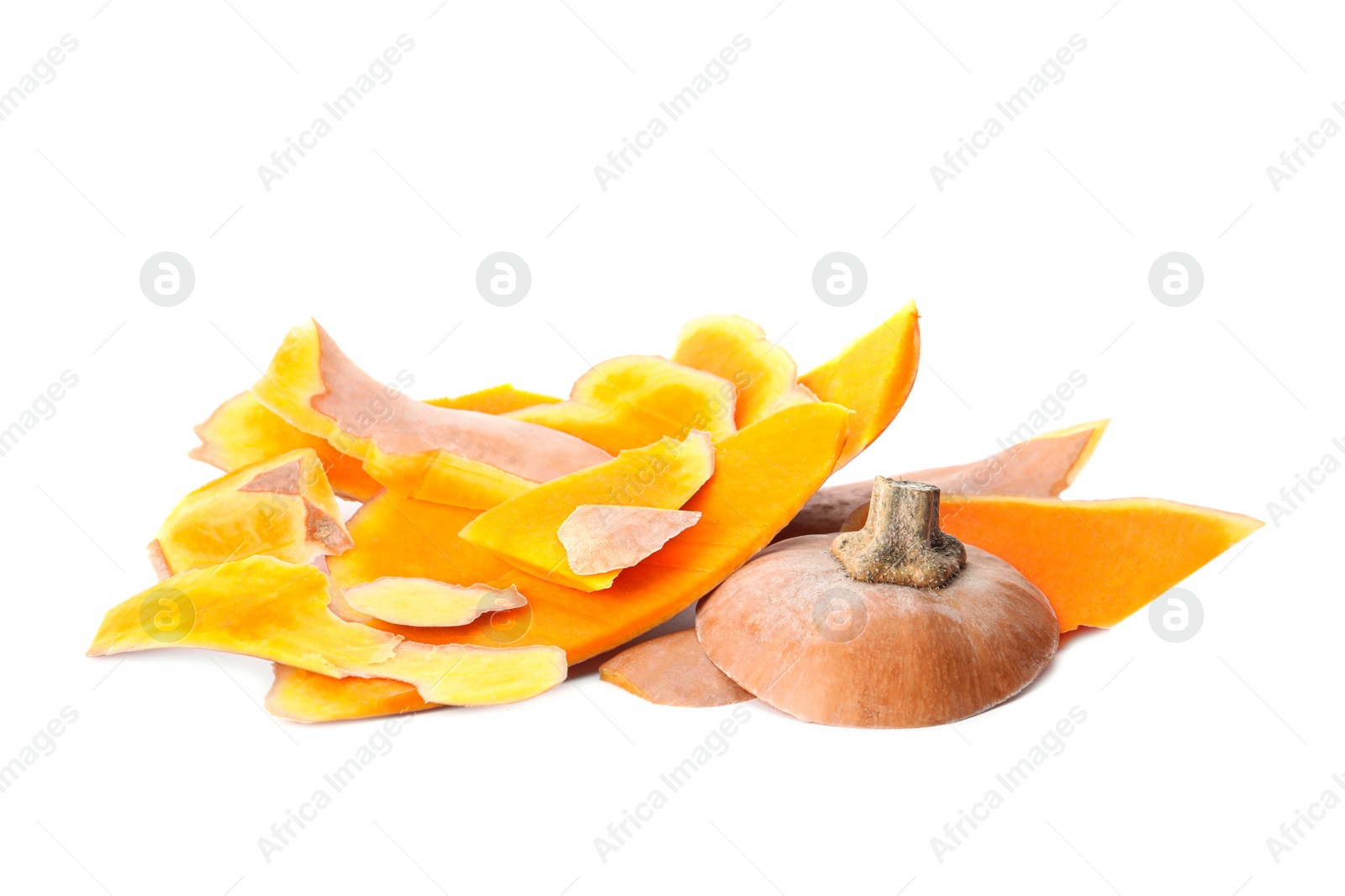 Photo of Pumpkin peel on white background. Composting of organic waste