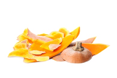 Photo of Pumpkin peel on white background. Composting of organic waste