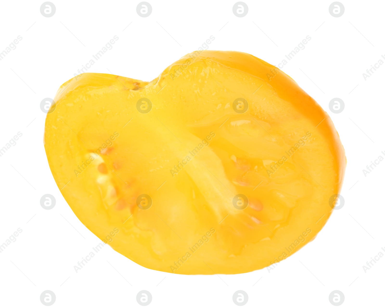 Photo of Slice of yellow tomato on white background