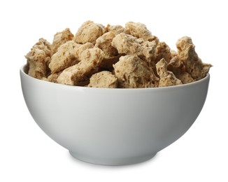 Photo of Dehydrated soy meat chunks in bowl on white background