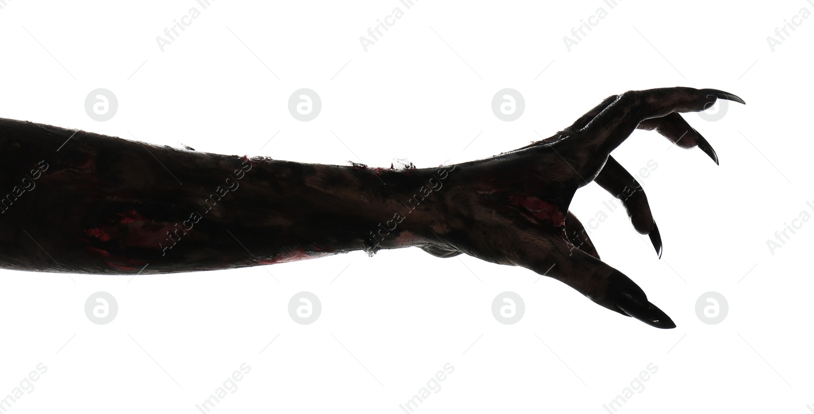 Photo of Scary monster on white background, closeup of hand. Halloween character