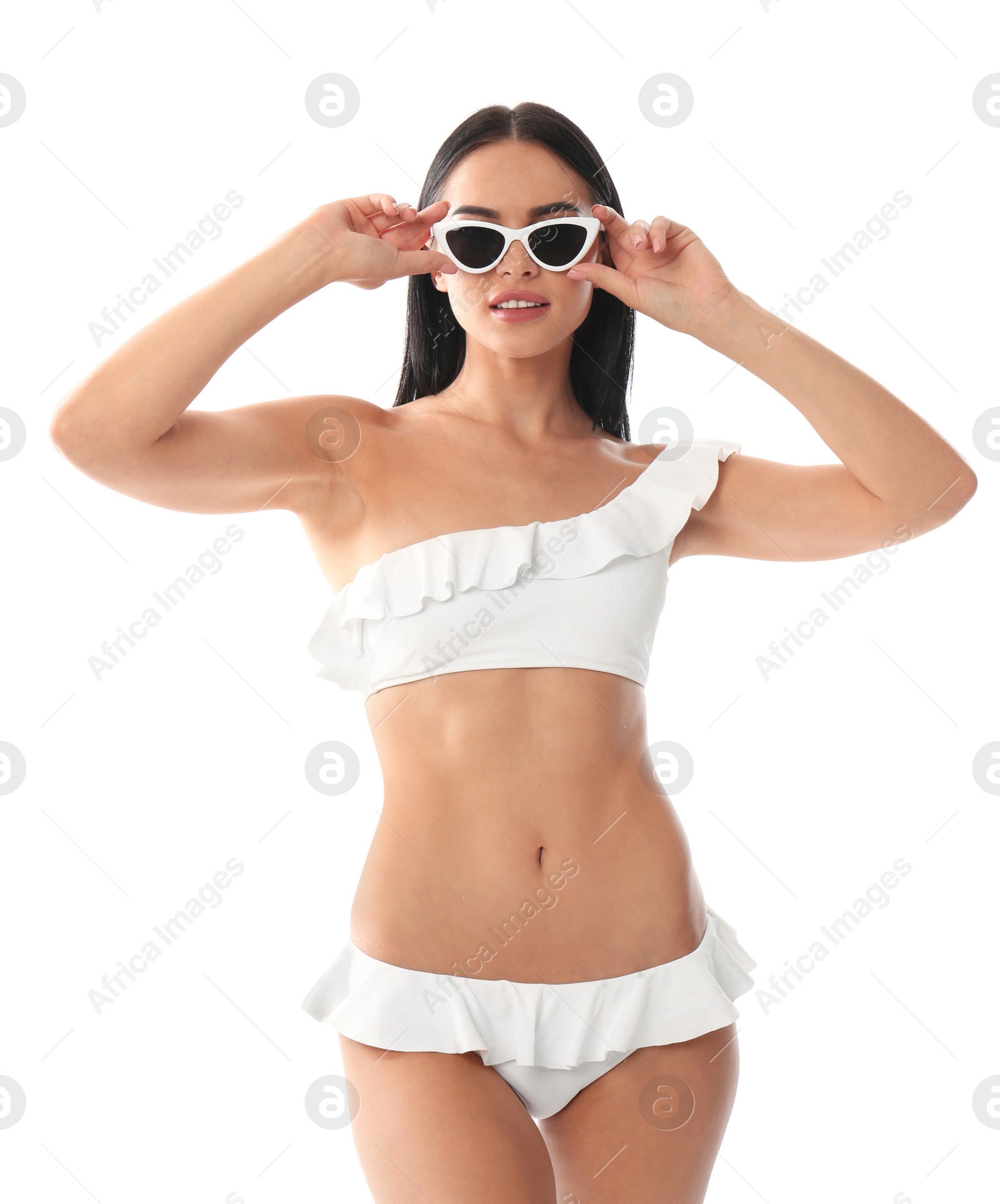 Photo of Beautiful young woman in stylish bikini with sunglasses on white background