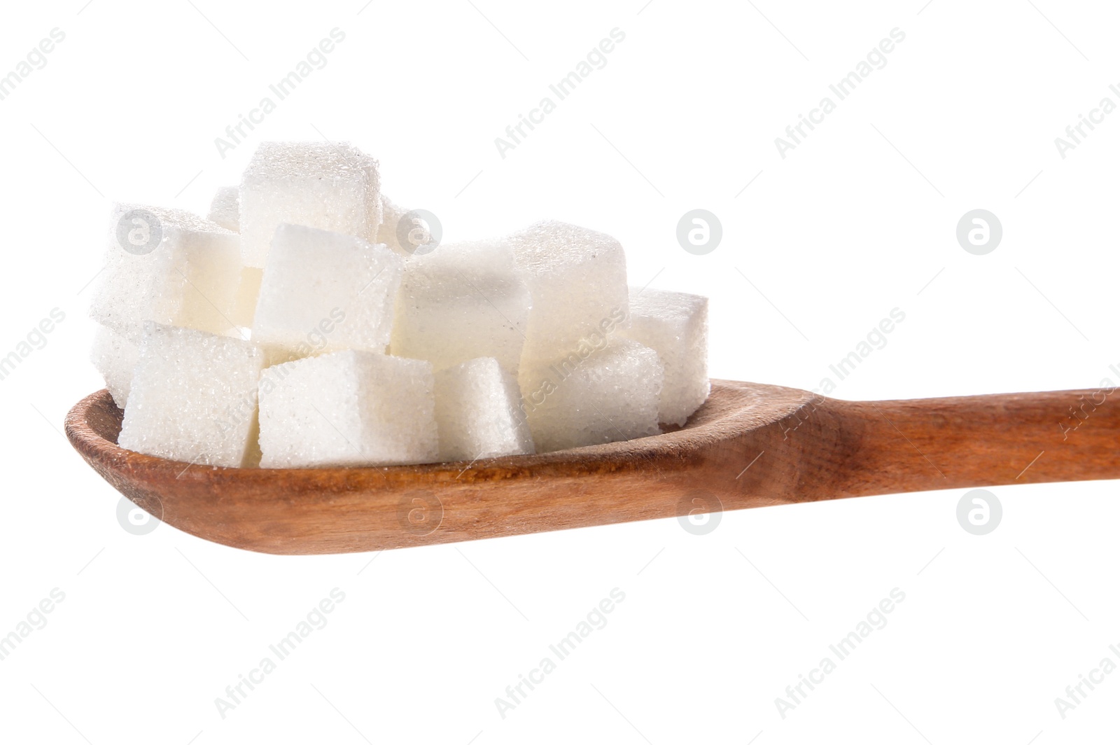 Photo of Refined sugar cubes in wooden spoon on white background