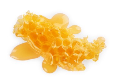 Photo of Piece of natural honeycomb with tasty honey isolated on white, top view