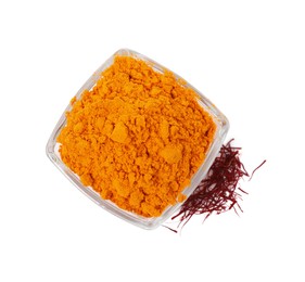 Photo of Bowl with saffron powder and dried flower stigmas on white background, top view
