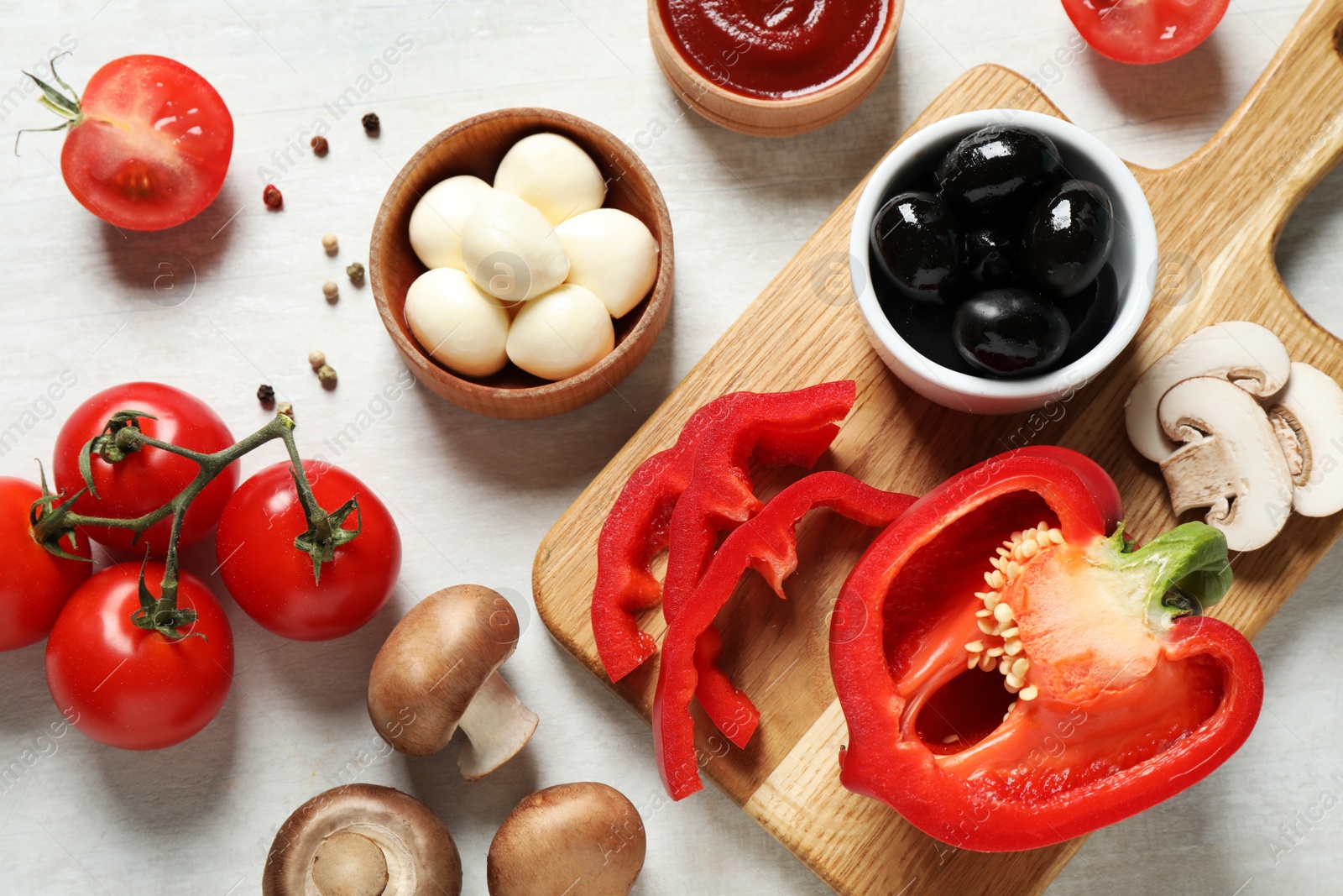 Photo of Flat lay composition with fresh ingredients for pizza on white wooden table