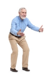 Senior man greeting someone on white background