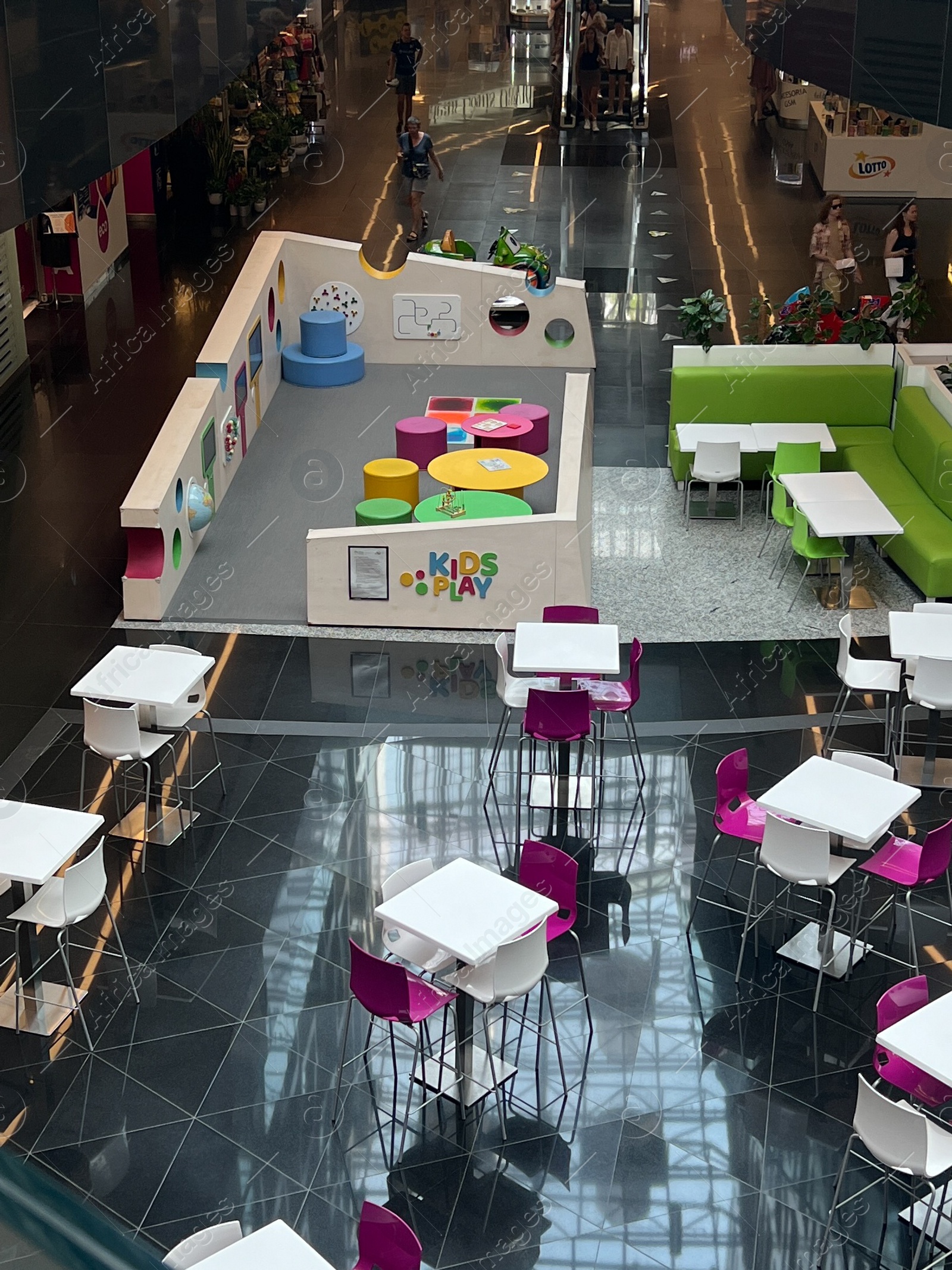 Photo of WARSAW, POLAND - JULY 23, 2022: Food court interior in shopping mall