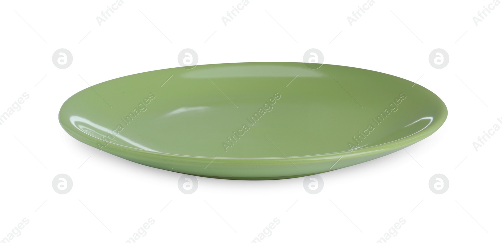 Photo of Empty light green ceramic plate isolated on white