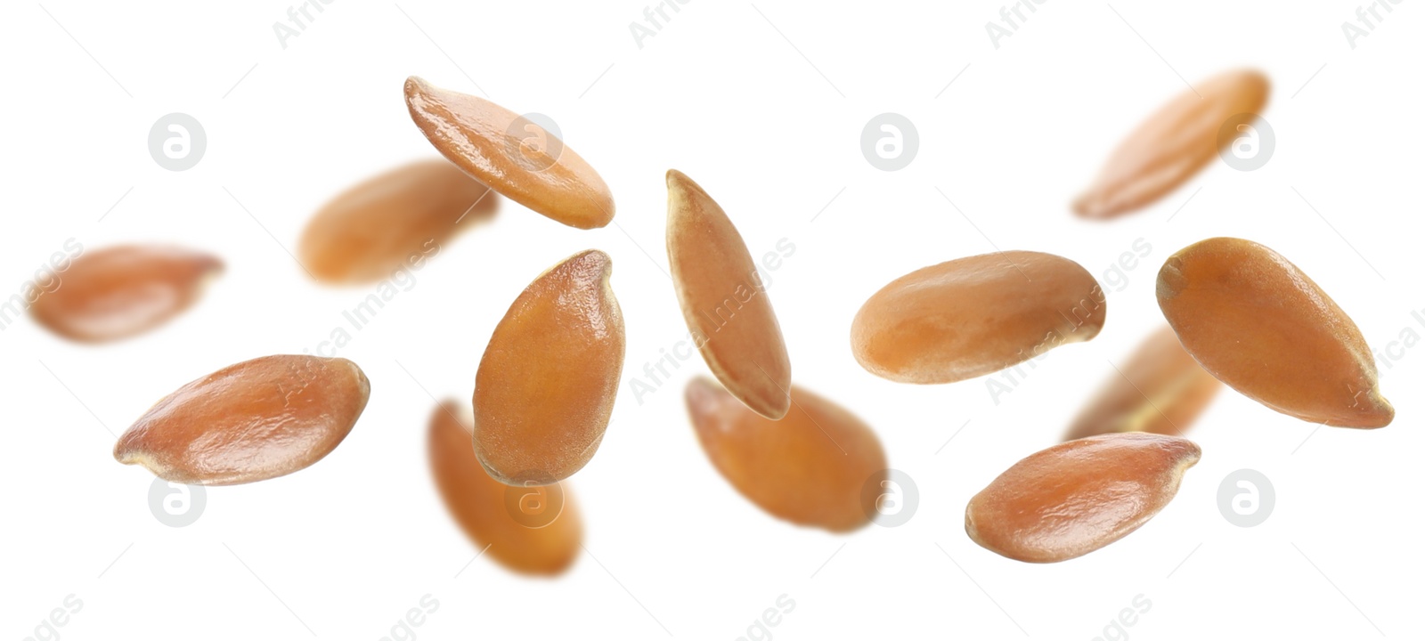 Image of Many linseeds falling on white background, banner design. Vegan diet  