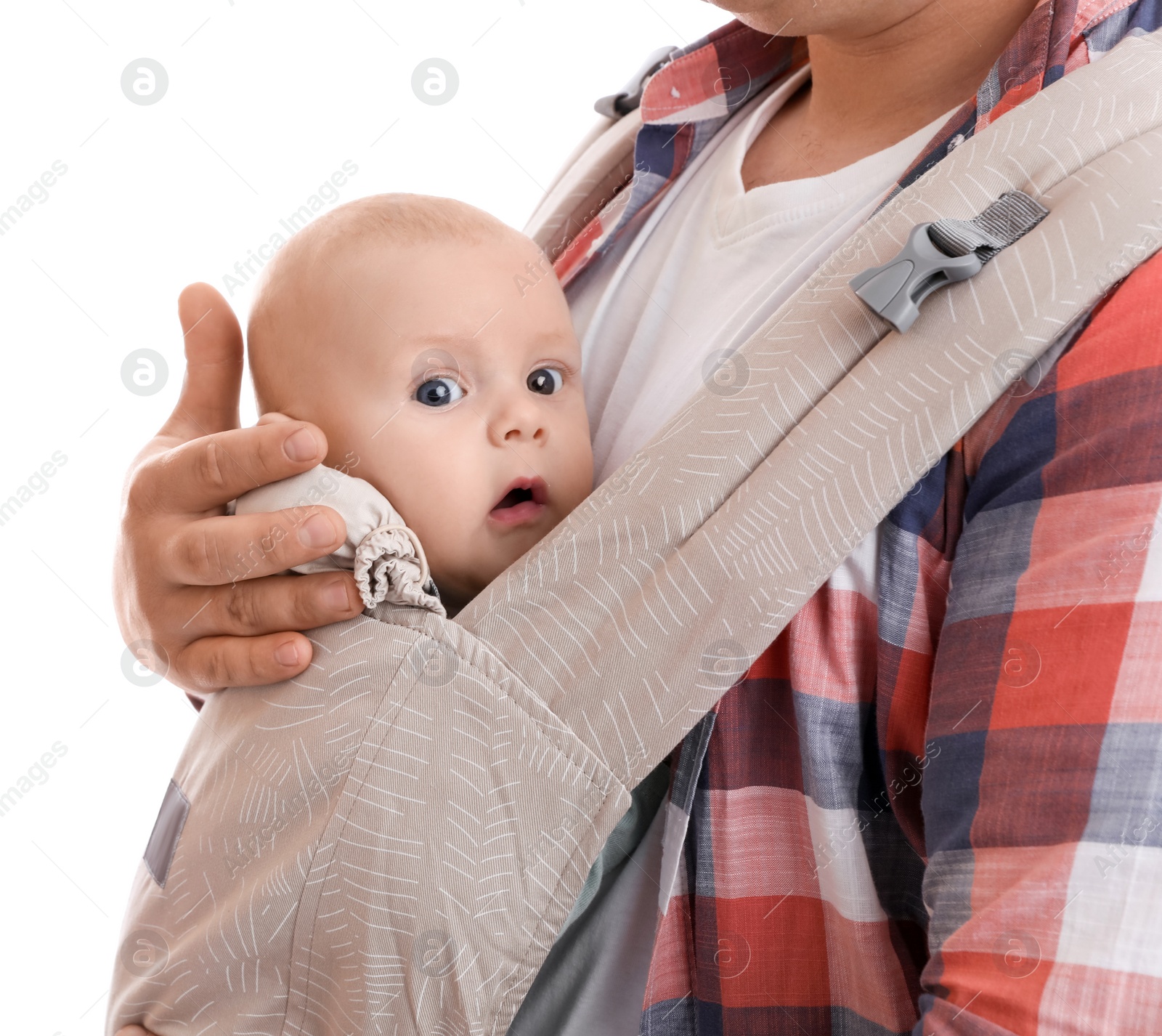 Photo of Father holding his child in baby carrier on white background, closeup