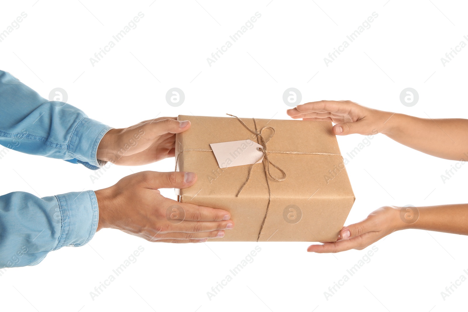 Photo of Woman receiving parcel from courier on white background, closeup