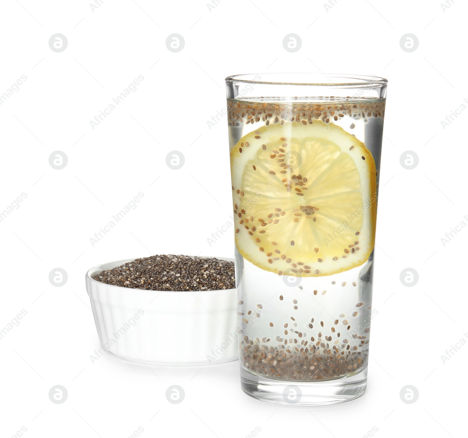 Photo of Glass of water with chia seeds and bowl on white background