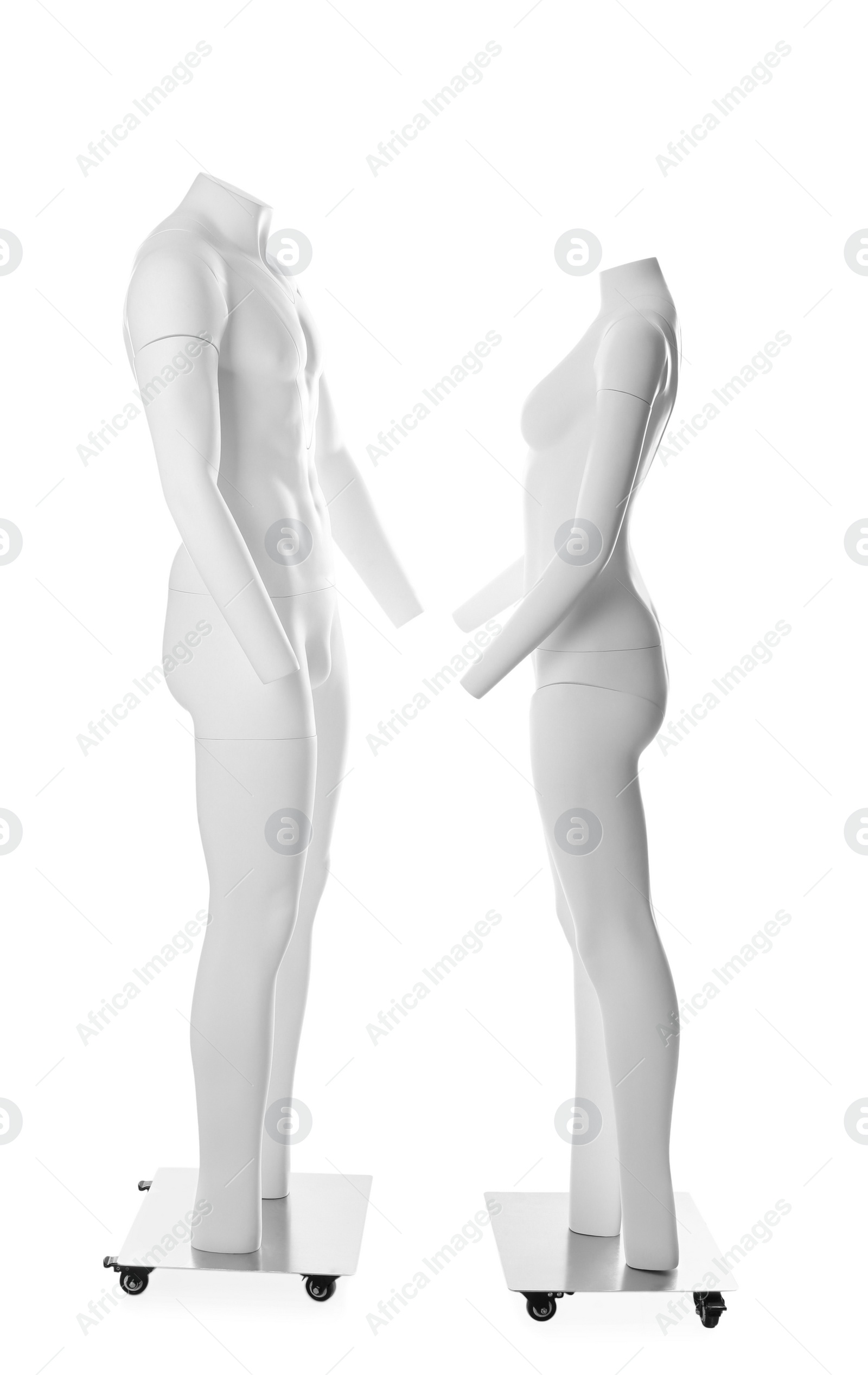 Photo of Male and female ghost headless mannequins with removable pieces isolated on white