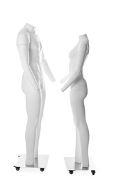 Male and female ghost headless mannequins with removable pieces isolated on white