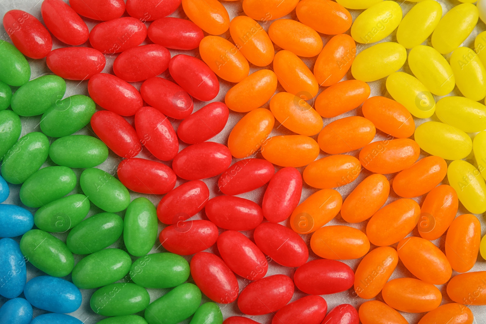 Photo of Delicious jelly beans of different colors, closeup