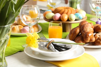 Festive Easter table setting with traditional meal