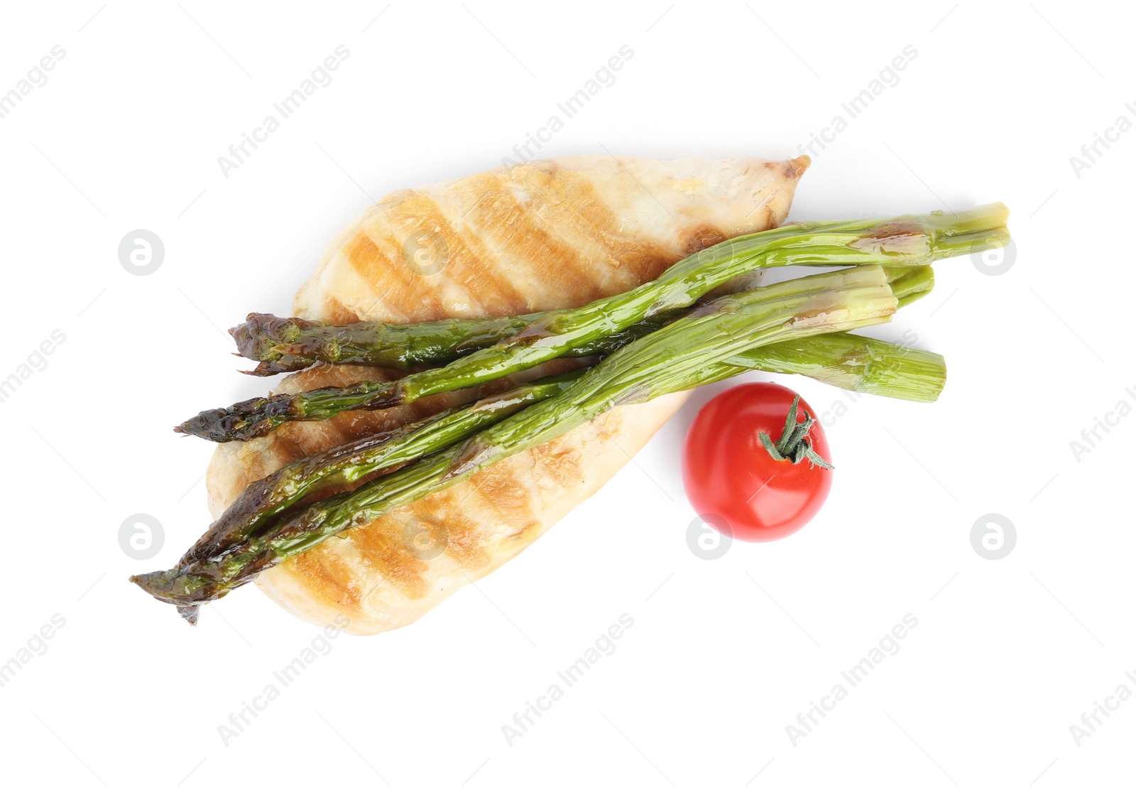 Photo of Tasty grilled chicken fillet with asparagus and cherry tomato isolated on white, top view