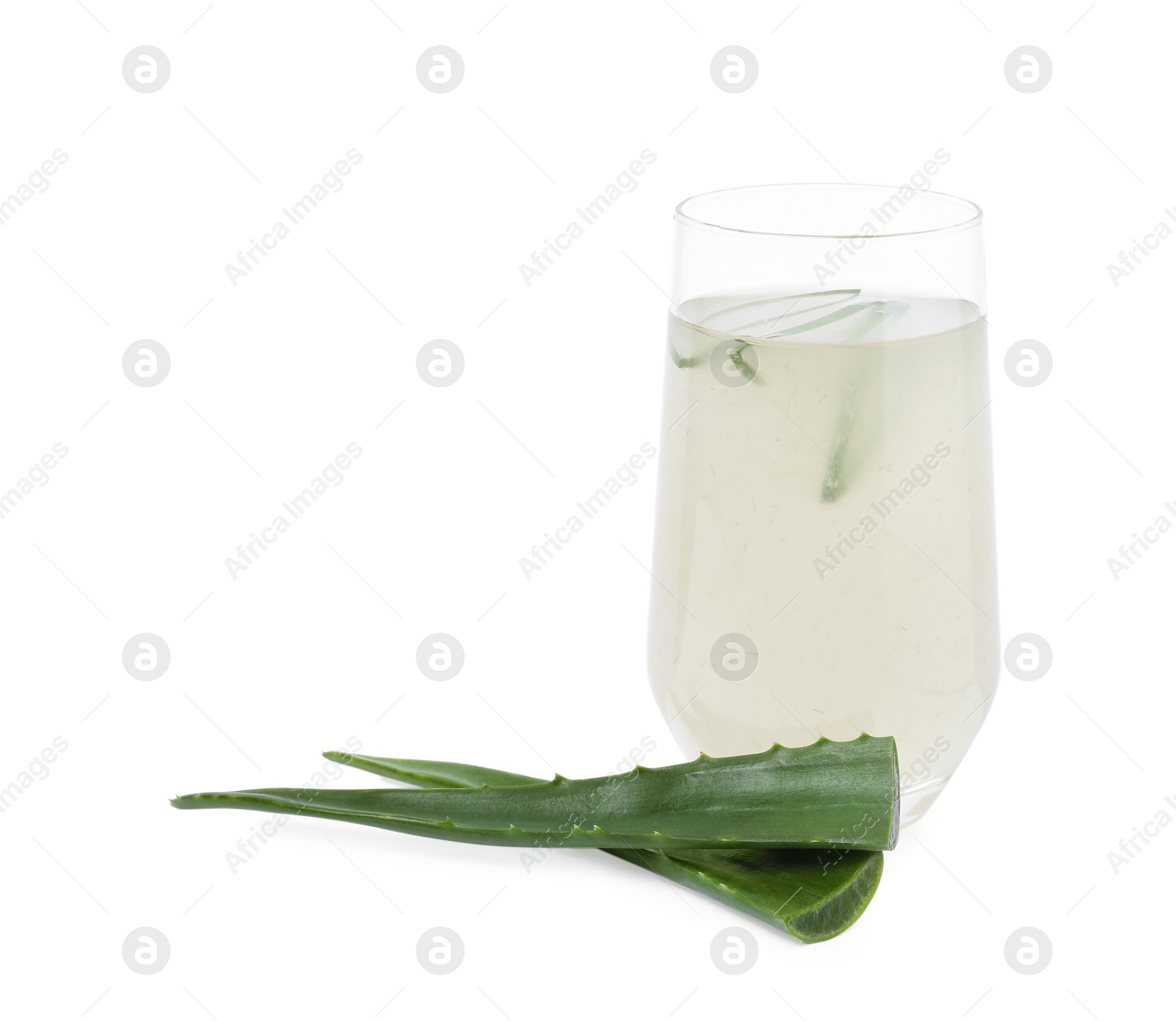 Photo of Tasty aloe juice in glass and cut fresh leaves isolated on white