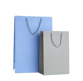 Photo of Different paper shopping bags isolated on white