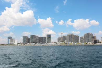 Photo of Beautiful view of city on sea shore