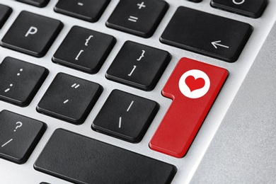 Image of Love button on laptop keyboard, closeup. Online dating site