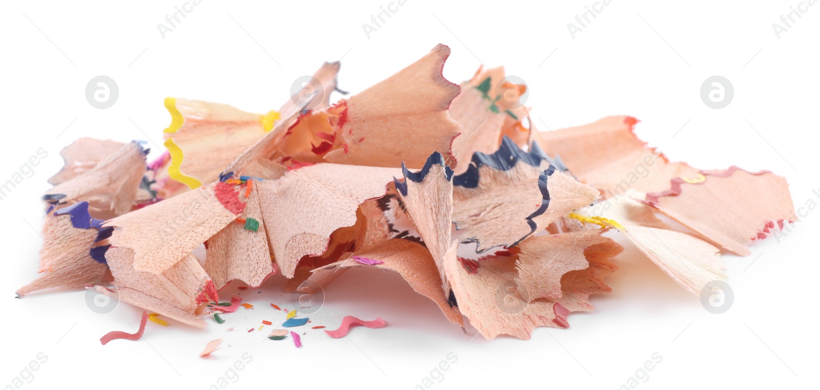 Photo of Pile of colorful pencil shavings on white background, closeup