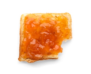 Photo of Bread with tasty apricot jam on white background, top view