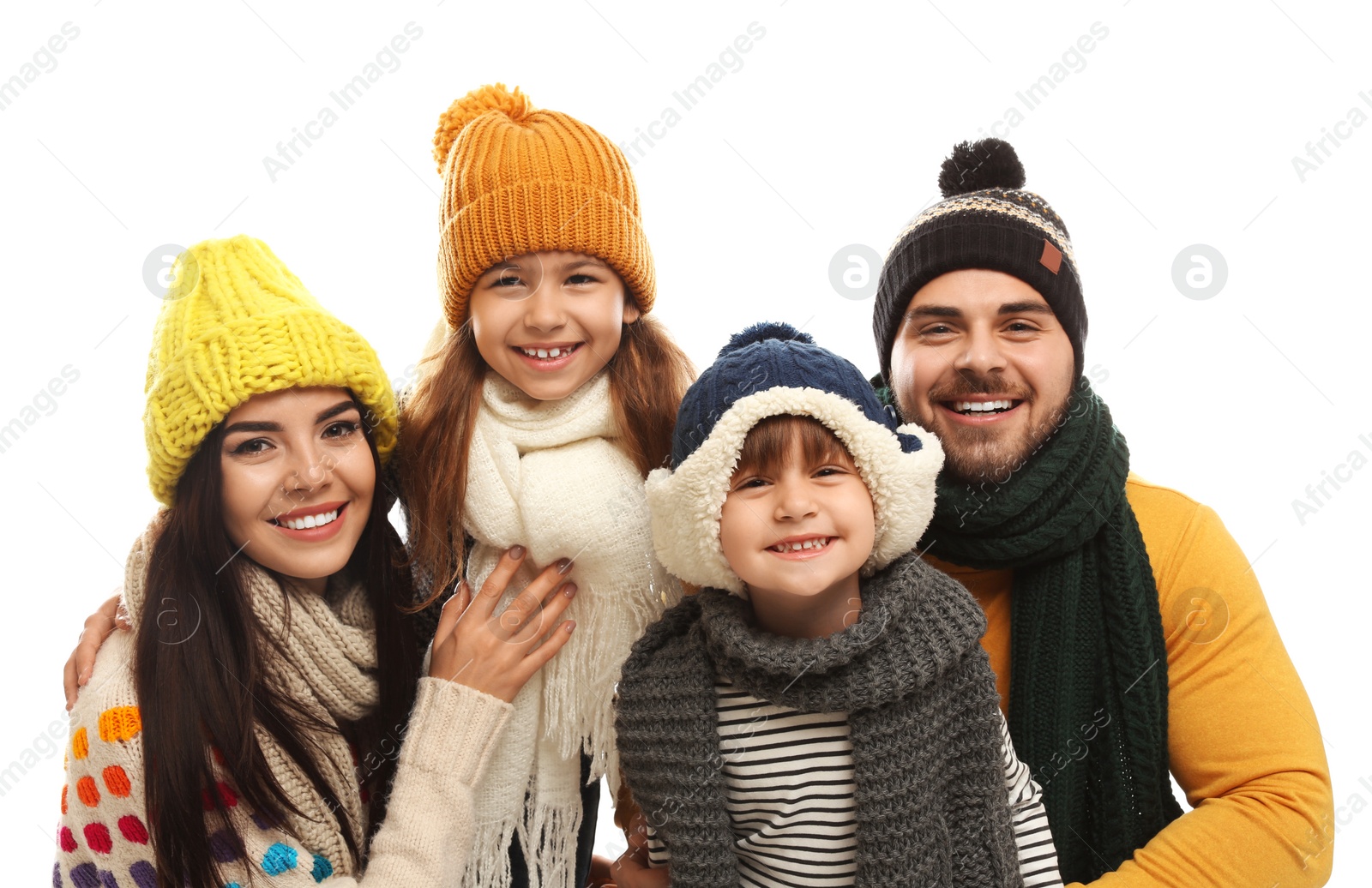 Photo of Happy family in warm clothes on white background. Winter vacation