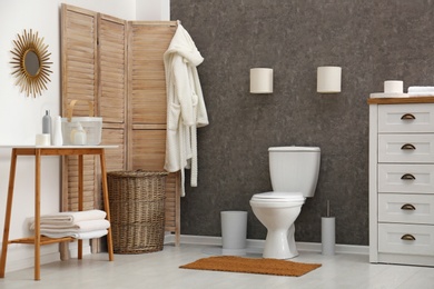 Ceramic toilet bowl in stylish bathroom. Idea for interior design