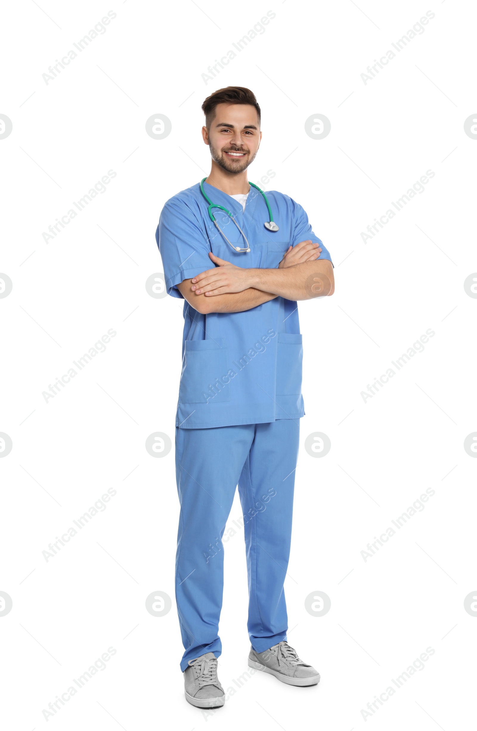 Photo of Full length portrait of medical doctor with stethoscope isolated on white