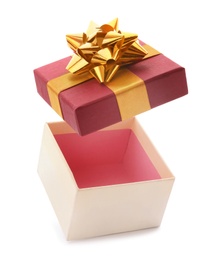 Photo of Open empty gift box with bow on white background