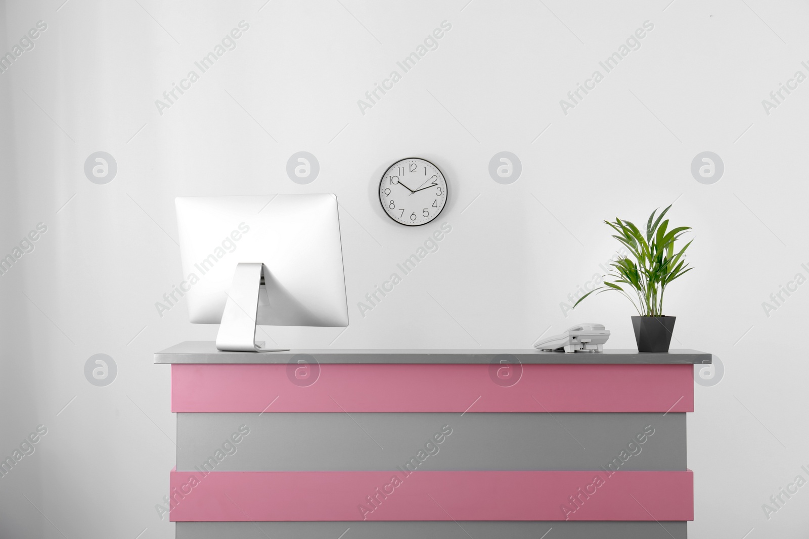 Photo of Modern reception desk in beauty salon. Stylish interior