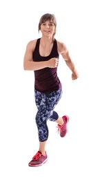 Photo of Young woman in sportswear running on white background