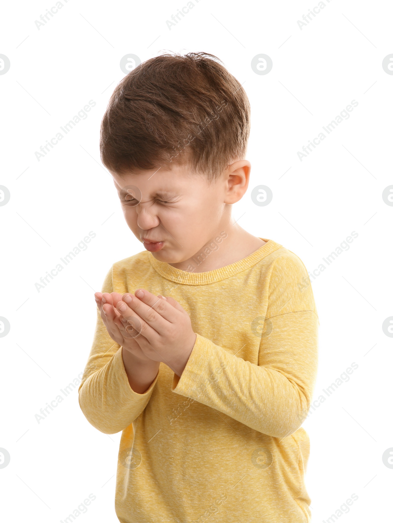Photo of Cute boy suffering from cold on white background