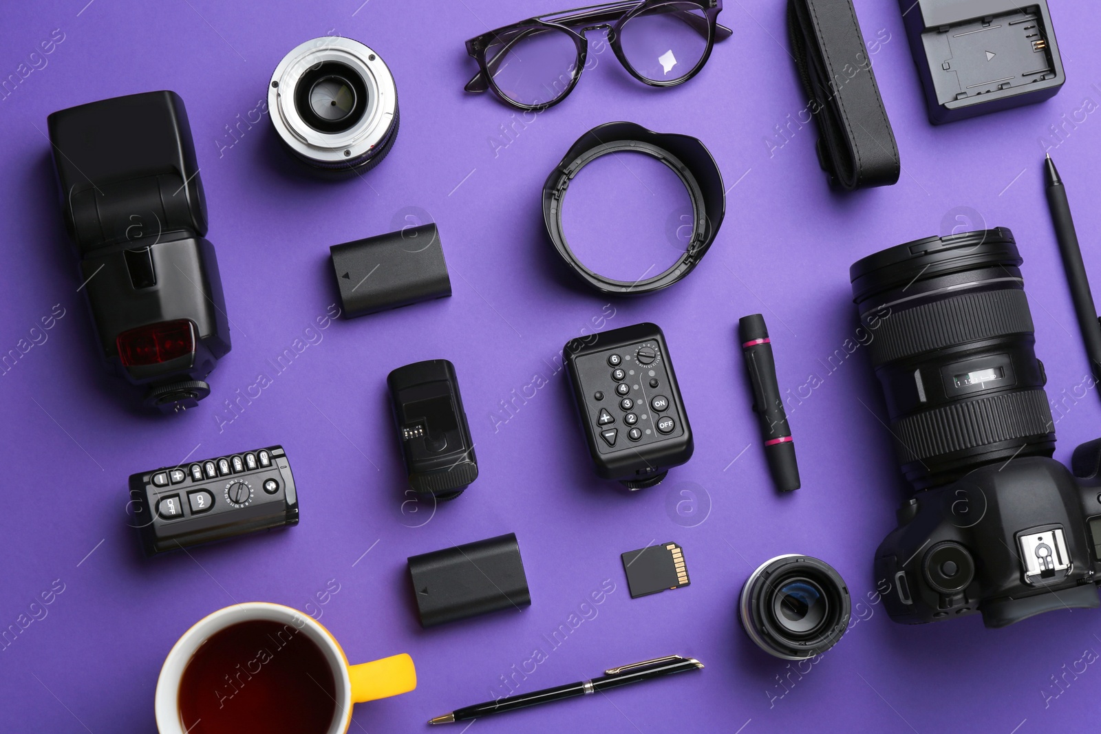 Photo of Flat lay composition with photographer's equipment and accessories on color background