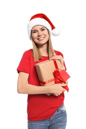 Young woman with Christmas gift on white background