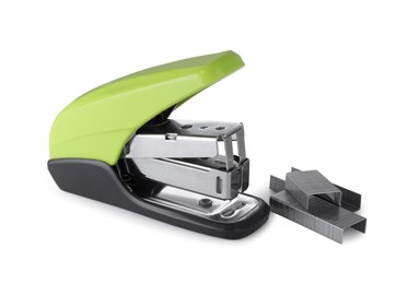 Photo of Bright green stapler with staples isolated on white