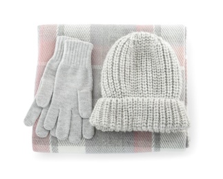 Woolen gloves, hat and scarf on white background, top view. Winter clothes