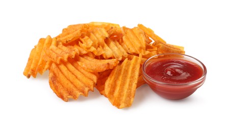 Photo of Delicious ridged chips with ketchup on white background