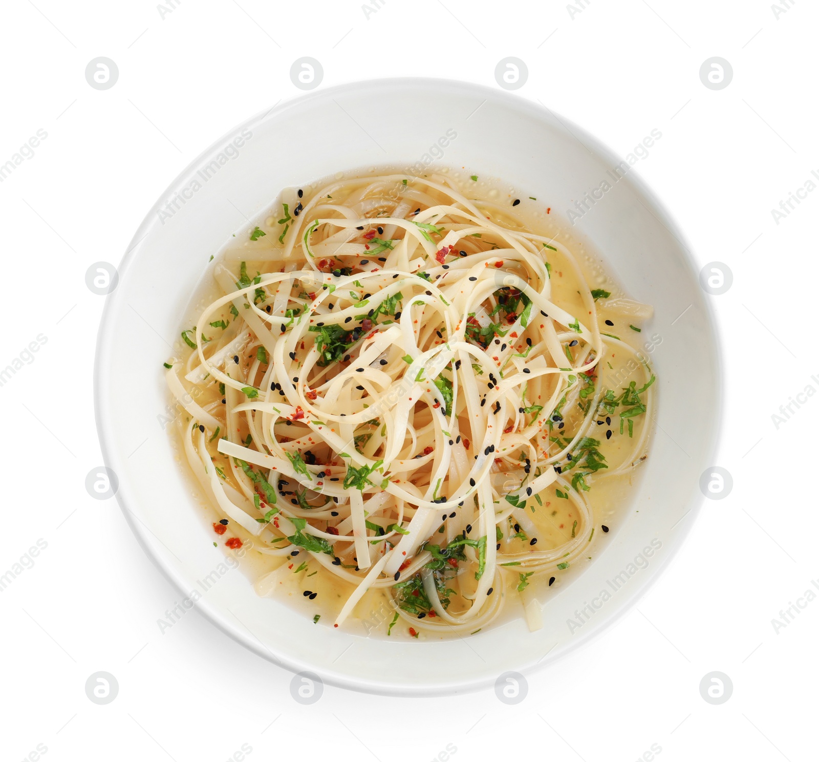 Photo of Plate of noodles with broth and herb isolated on white, top view