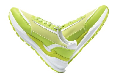Photo of Pair of stylish light green sneakers on white background