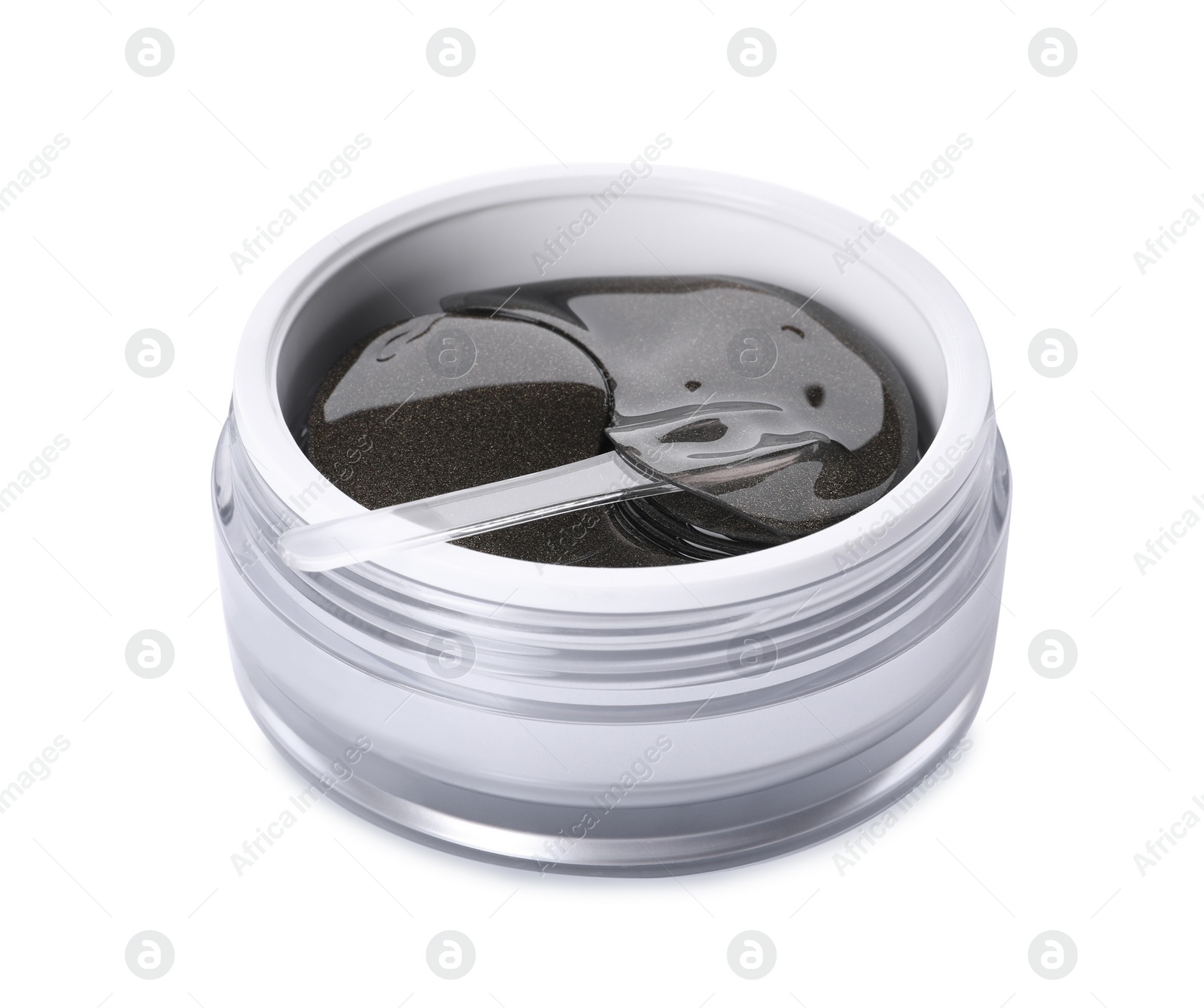 Photo of Under eye patches in jar with spatula isolated on white. Cosmetic product