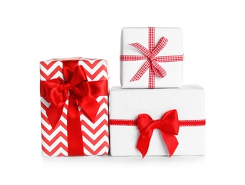 Beautifully wrapped gift boxes on white background