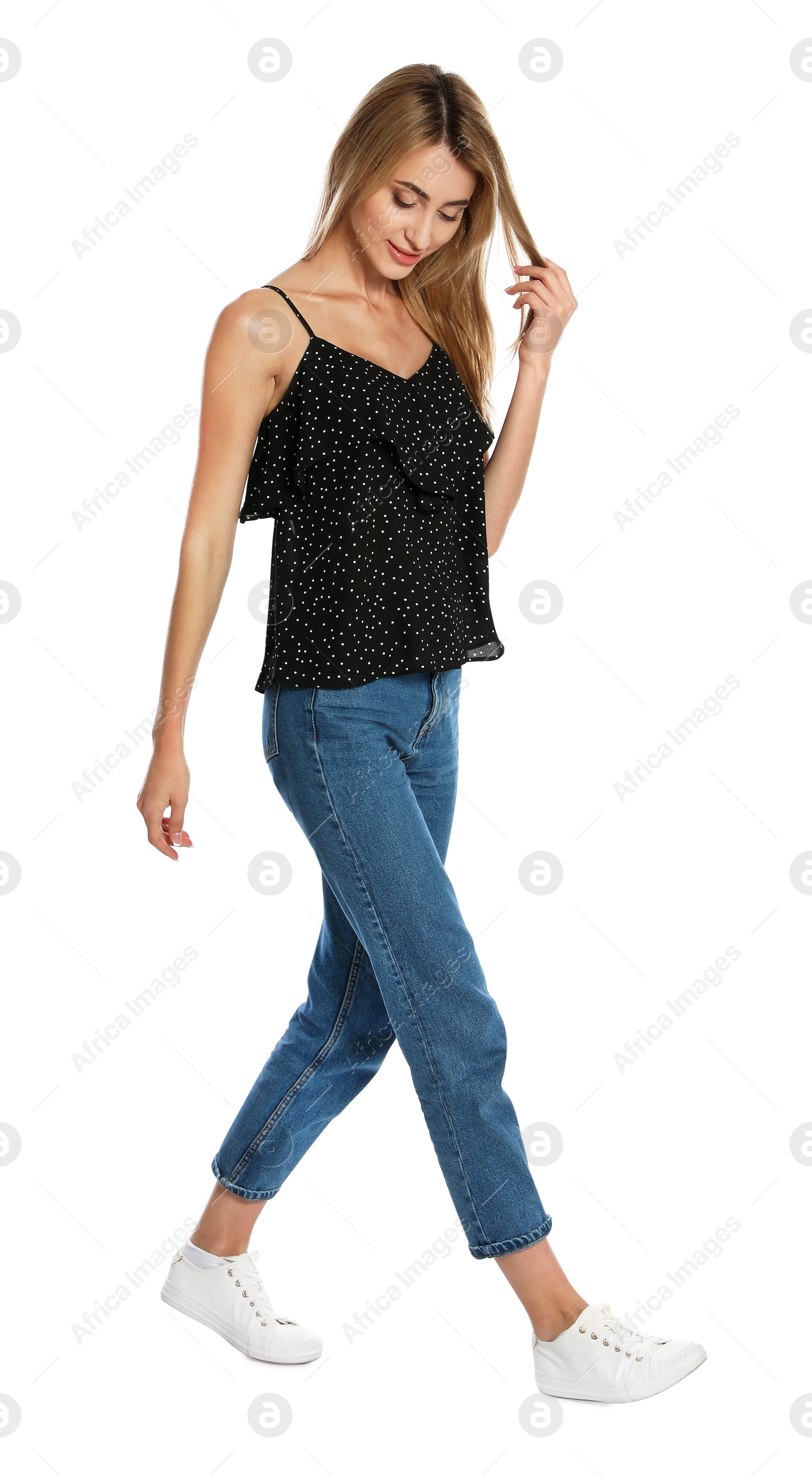 Photo of Beautiful young woman posing on white background