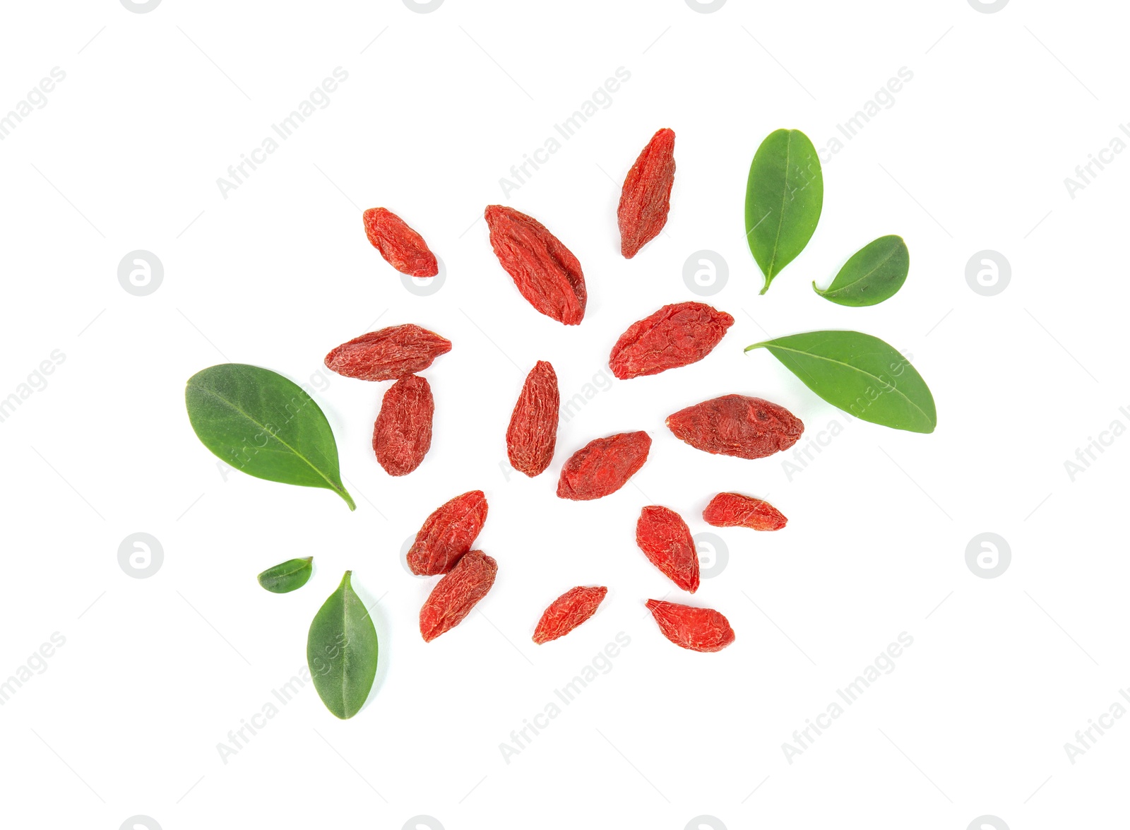 Photo of Tasty dried goji berries and leaves on white background, top view