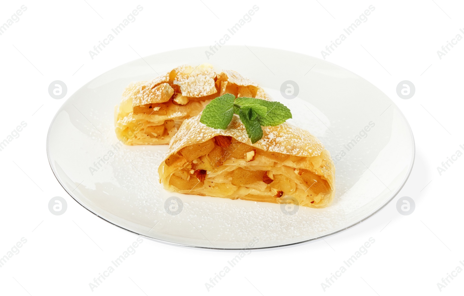 Photo of Pieces of delicious apple strudel with almonds, powdered sugar and mint on white background