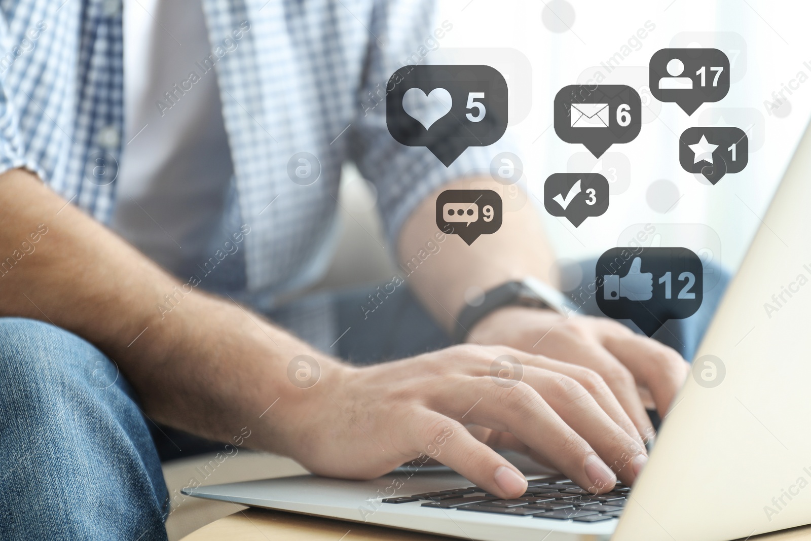 Image of Man working on modern laptop at table indoors, closeup. Social media marketing