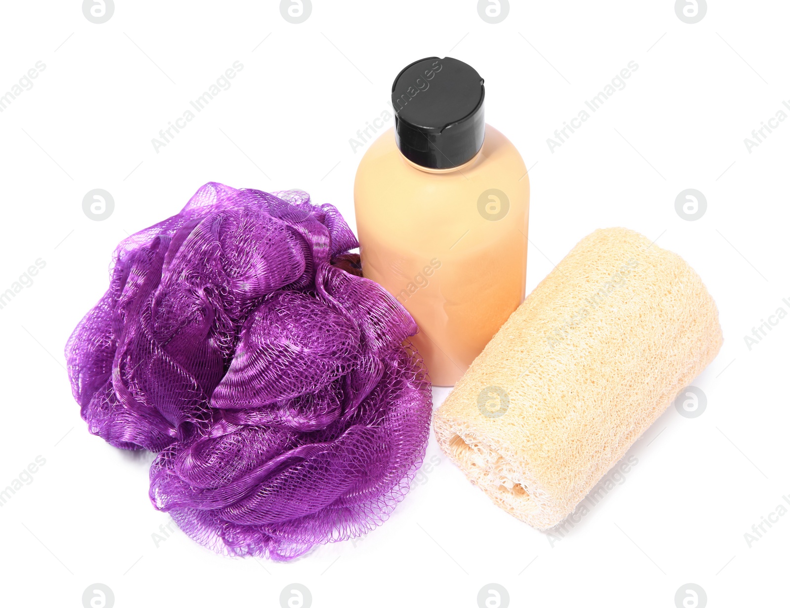 Photo of New shower puff, loofah sponge and bottle of cosmetic product on white background