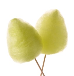 Photo of Two sweet yellow cotton candies isolated on white